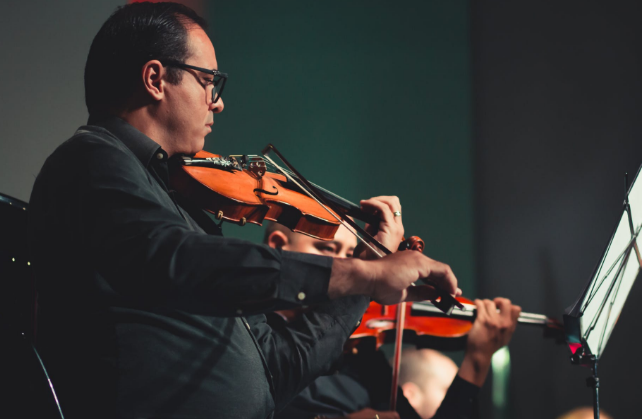 man playing a violin